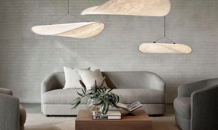 tense pendants hung over couch