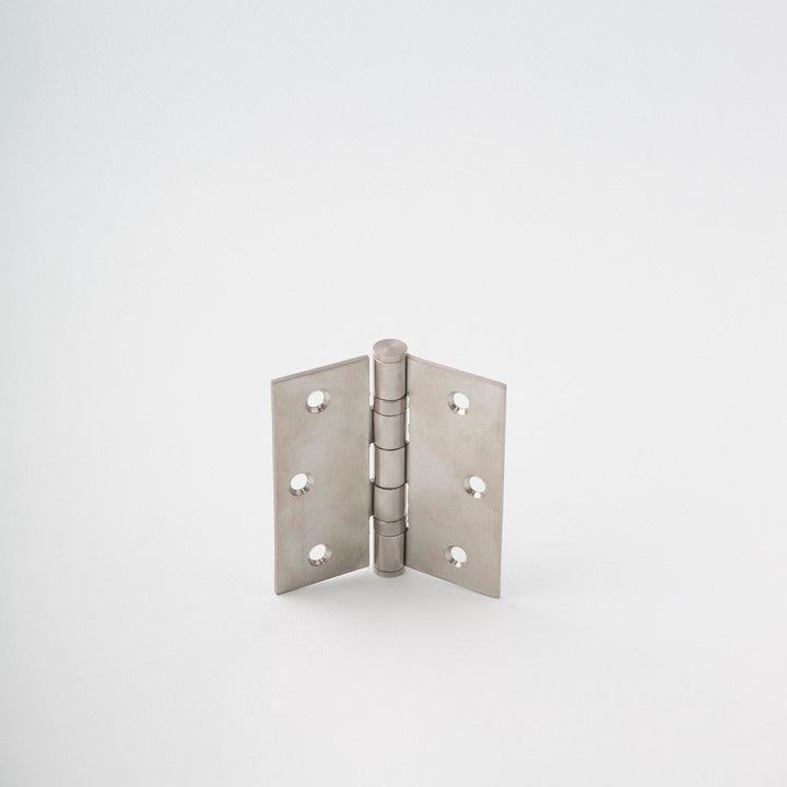 Classically designed stainless steel door hinge.