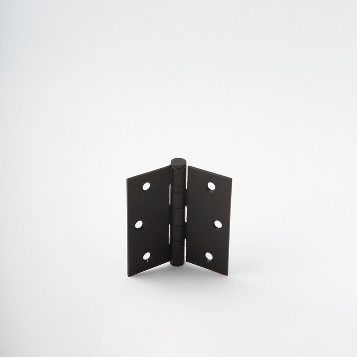 Classically designed black door hinge.