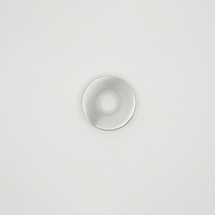 A close up of an AHI Roses for Door Levers on a white surface.