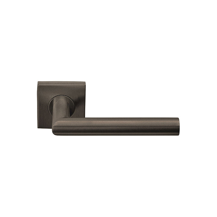 A close up of a Formani BASICS LB2-19BSQ Door Lever on a white background.