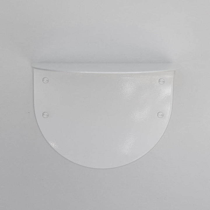 A close up of a CSSN BENDE Shelf Ledge on a wall.