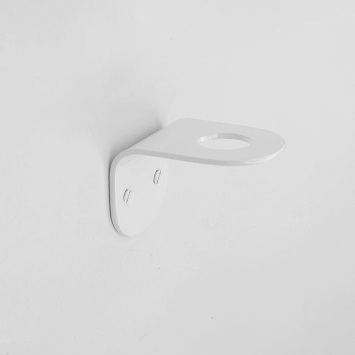 A CSSN BENDE Soap Holder Bracket Single mounted on a white wall.