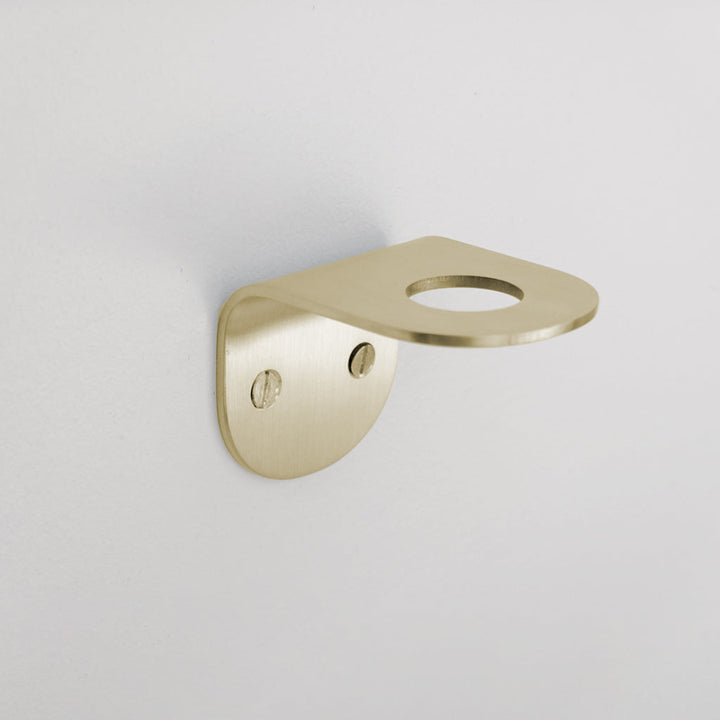 A CSSN BENDE Soap Holder Bracket Single on a white wall.