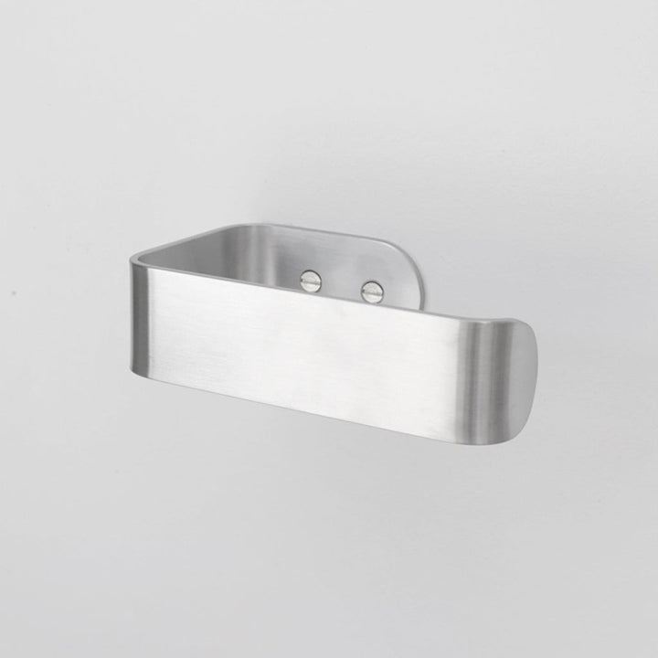 A CSSN BENDE Toilet Roll Holder on a white wall.