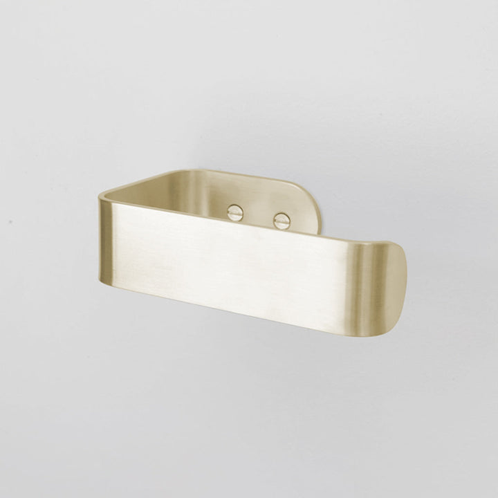 A CSSN BENDE Toilet Roll Holder hanging on a wall.
