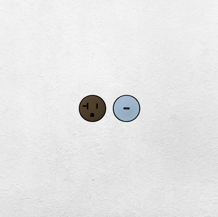 Two colorful flush style sockets by Bocci22, one Carob brown and one Ice blue, on a white textured background.