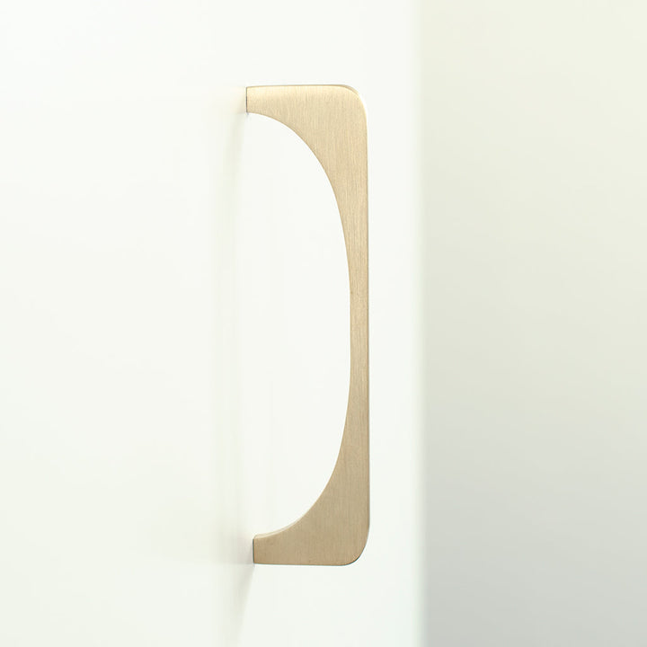 A Baccman Berglund Bridge Pull on a white wall.