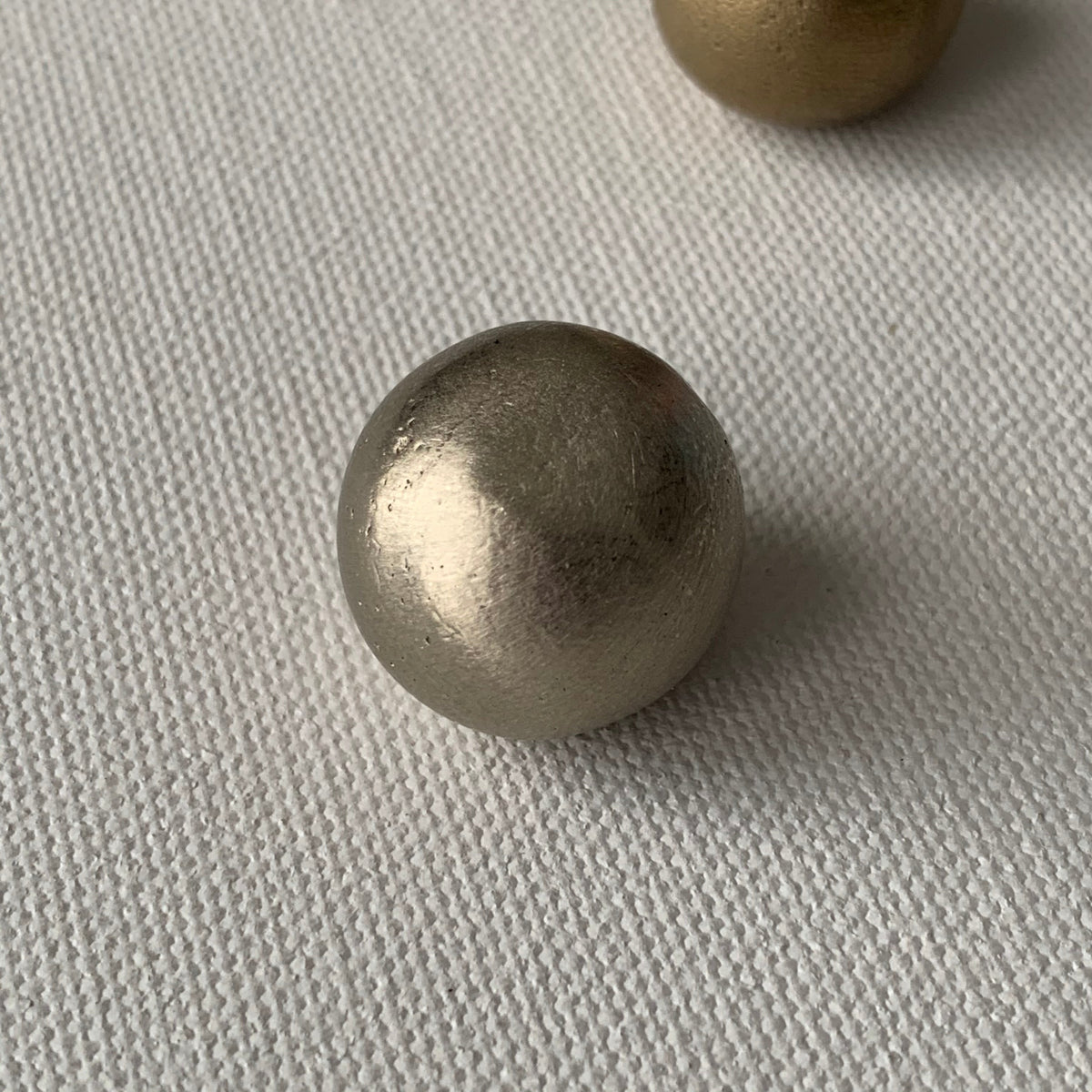 solid cast natural and white brass and bronze small cabinet hardware knob and handle by Maha Alavi