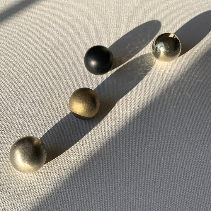 solid cast natural and white brass and bronze small cabinet hardware knob and handle by Maha Alavi