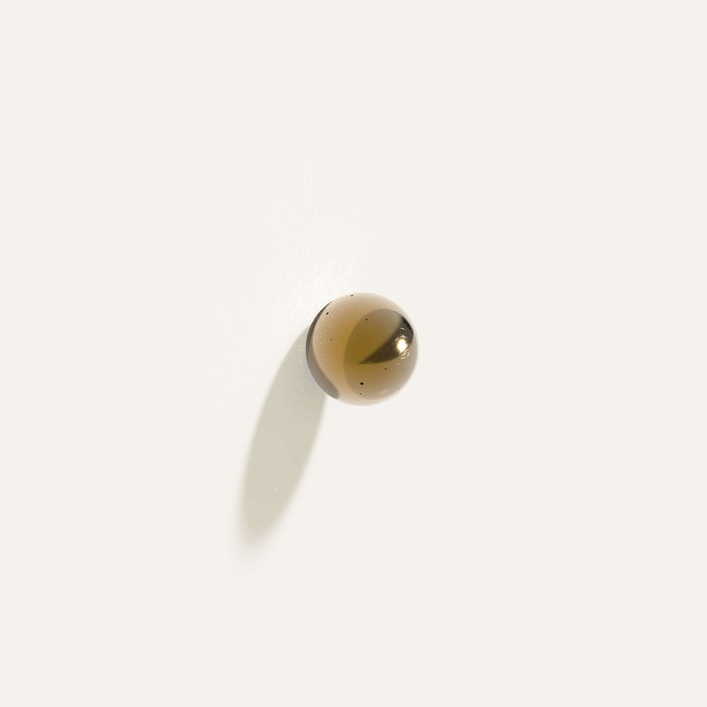 Satin brass Maha Alavi Cercle knob or pull, a small cast ball.