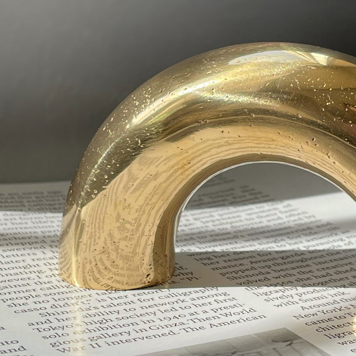 solid cast natural and white brass and bronze curved cabinet hardware handle by Maha Alavi