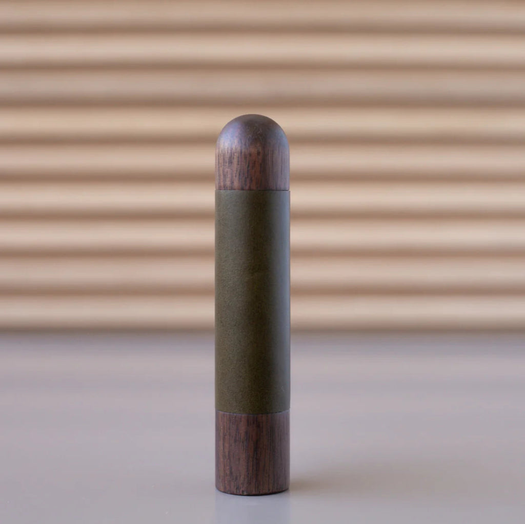 Chapman & Bose wood appliance bar pull with a walnut body and a olive leather half-leather wrap.