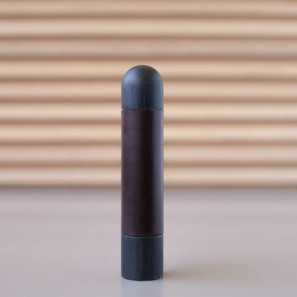 Chapman & Bose wood appliance bar pull with a walnut body and a maroon leather half-wrap.