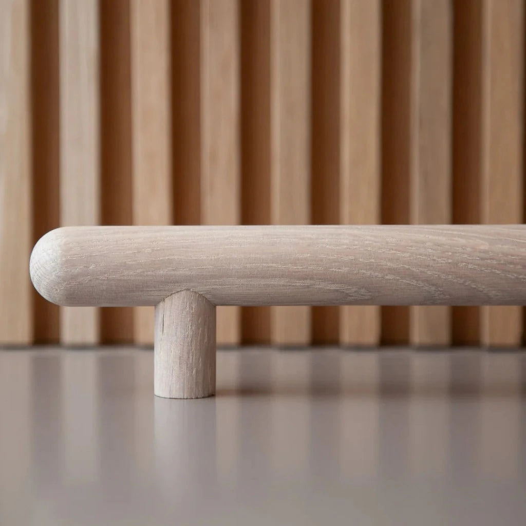 Ash wood Chapman & Bose bar pull, a turned round bar on two posts.