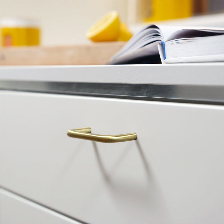 Charlie Bar Pull on modern kitchen drawer. This modern handle is made in Toronto.