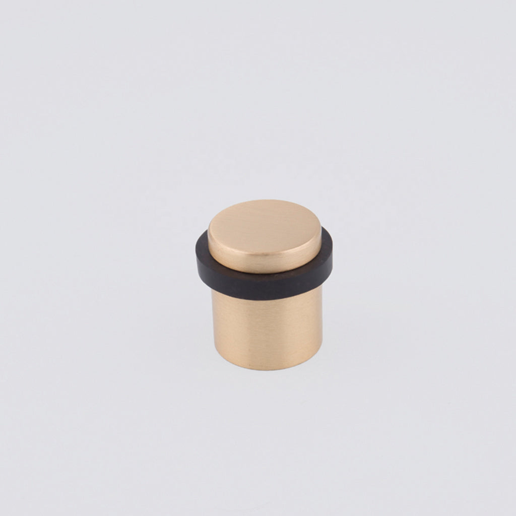 Charlie Door Stop Satin Brass. Made in Toronto.