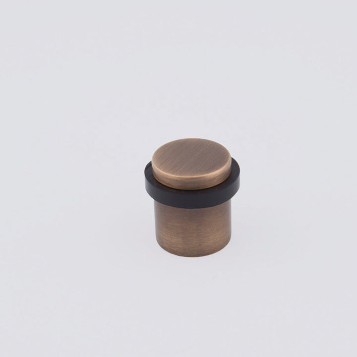 Charlie Door Stop Satin Antique Brass. Made in Toronto.