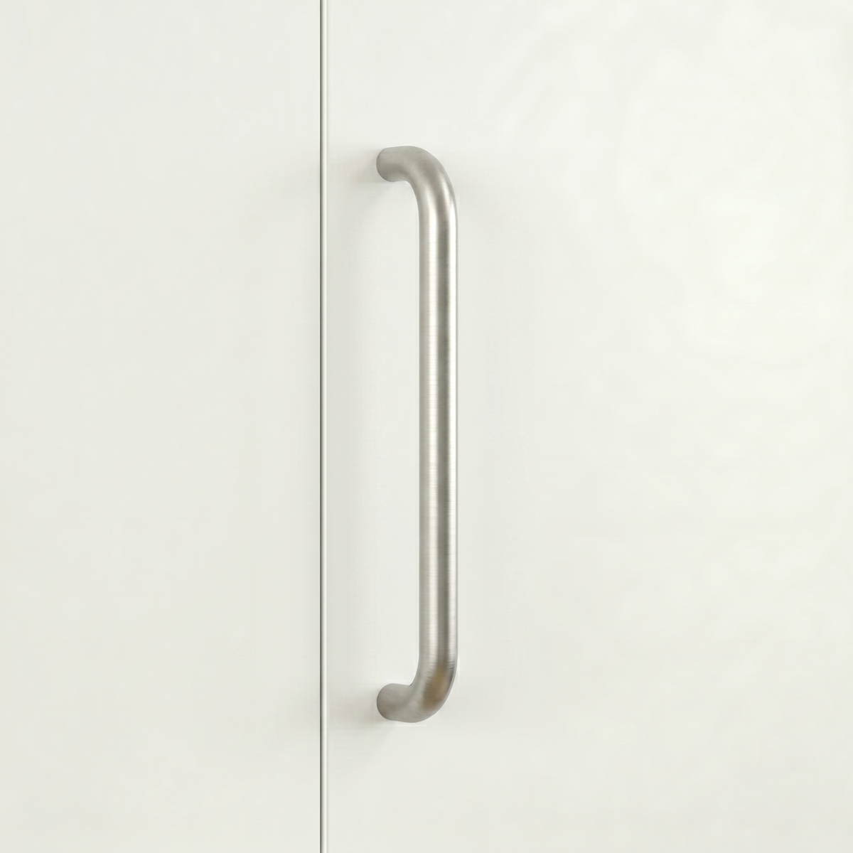 Satin stainless steel Charlie Radius cabinet and appliance pull, a D-shaped tubular handle with radiused corners, mounted vertically on cabinetry.