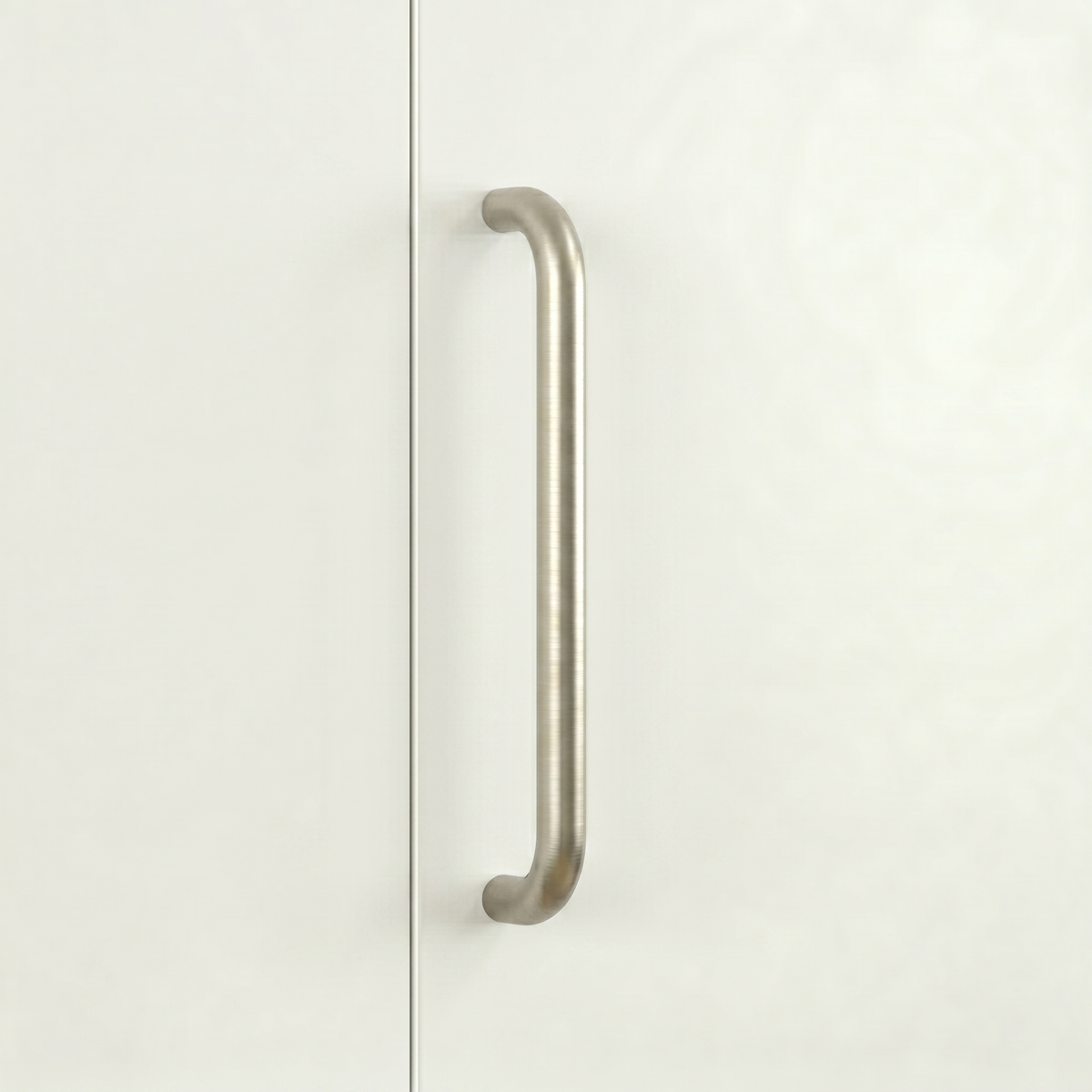 Satin nickel Charlie Radius cabinet and appliance pull, a D-shaped tubular handle with radiused corners, mounted vertically on cabinetry.