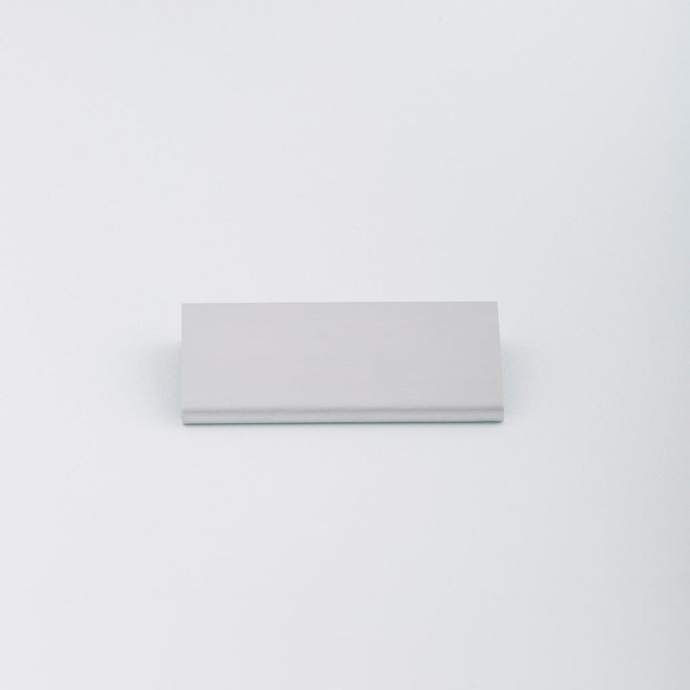 Simple Aluminum Tab pull with circular round edge profile. Made in Toronto.