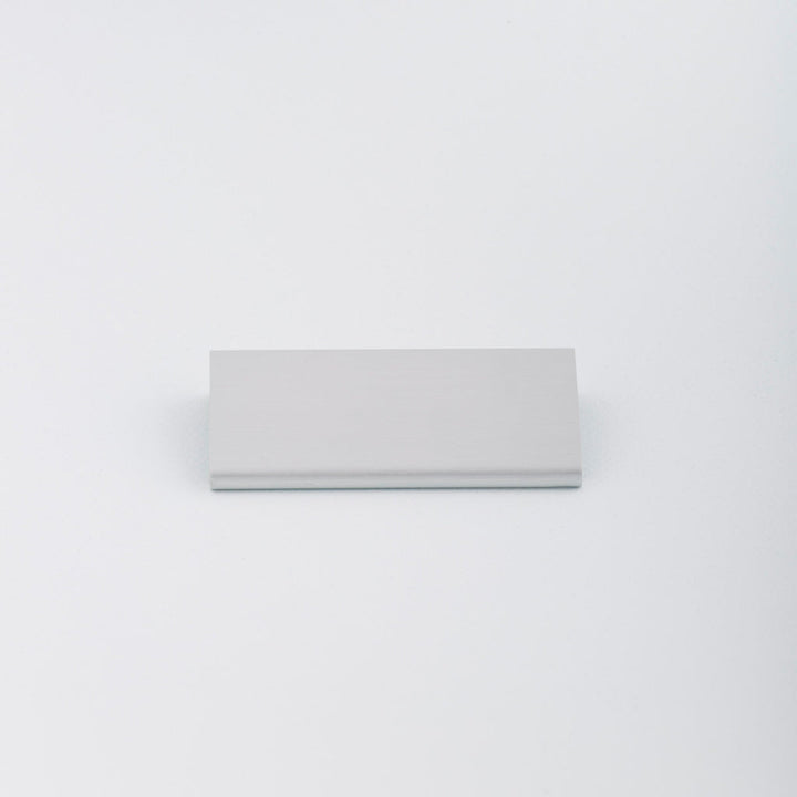 Simple Aluminum Tab pull with circular round edge profile. Made in Toronto.