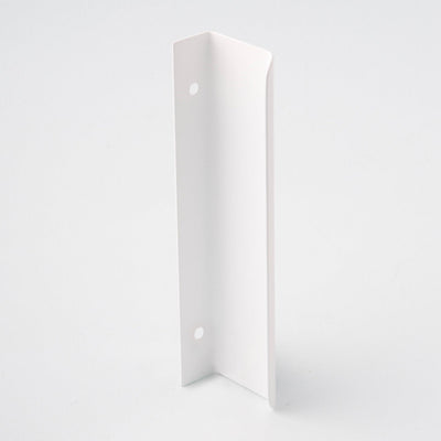 Long white tab pull for cabinets. Simple and minimal hardware. Made in Toronto. From the back. 