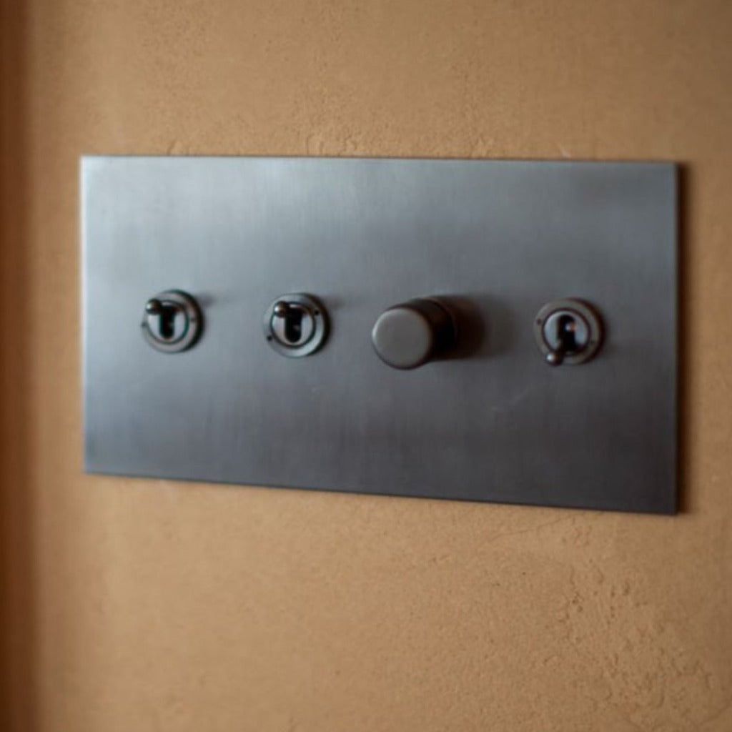 Forbes & Lomax combination toggle switch and rotary dimmer plate.