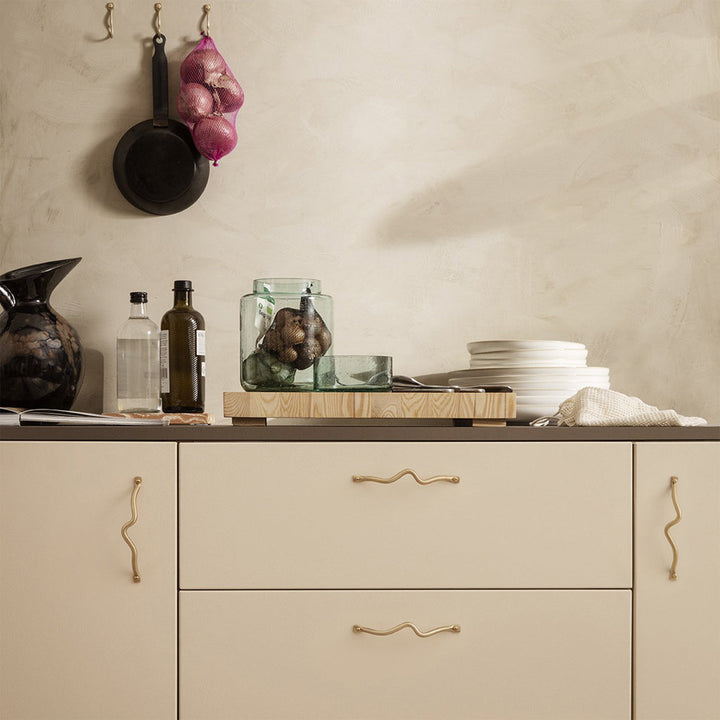 Curvature handles, brass finish, cabinet & drawer pulls.