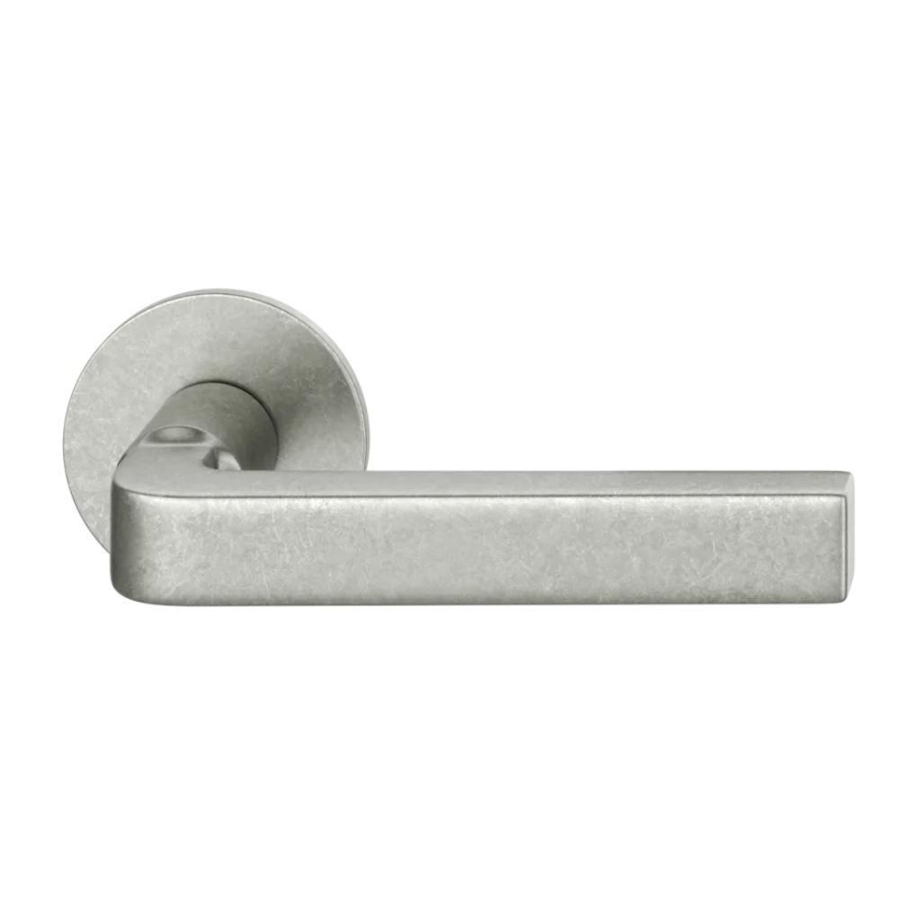 Aluminum pure natural FSB 1004 door lever, a square-grip lever with an angled bend, on a round rose.