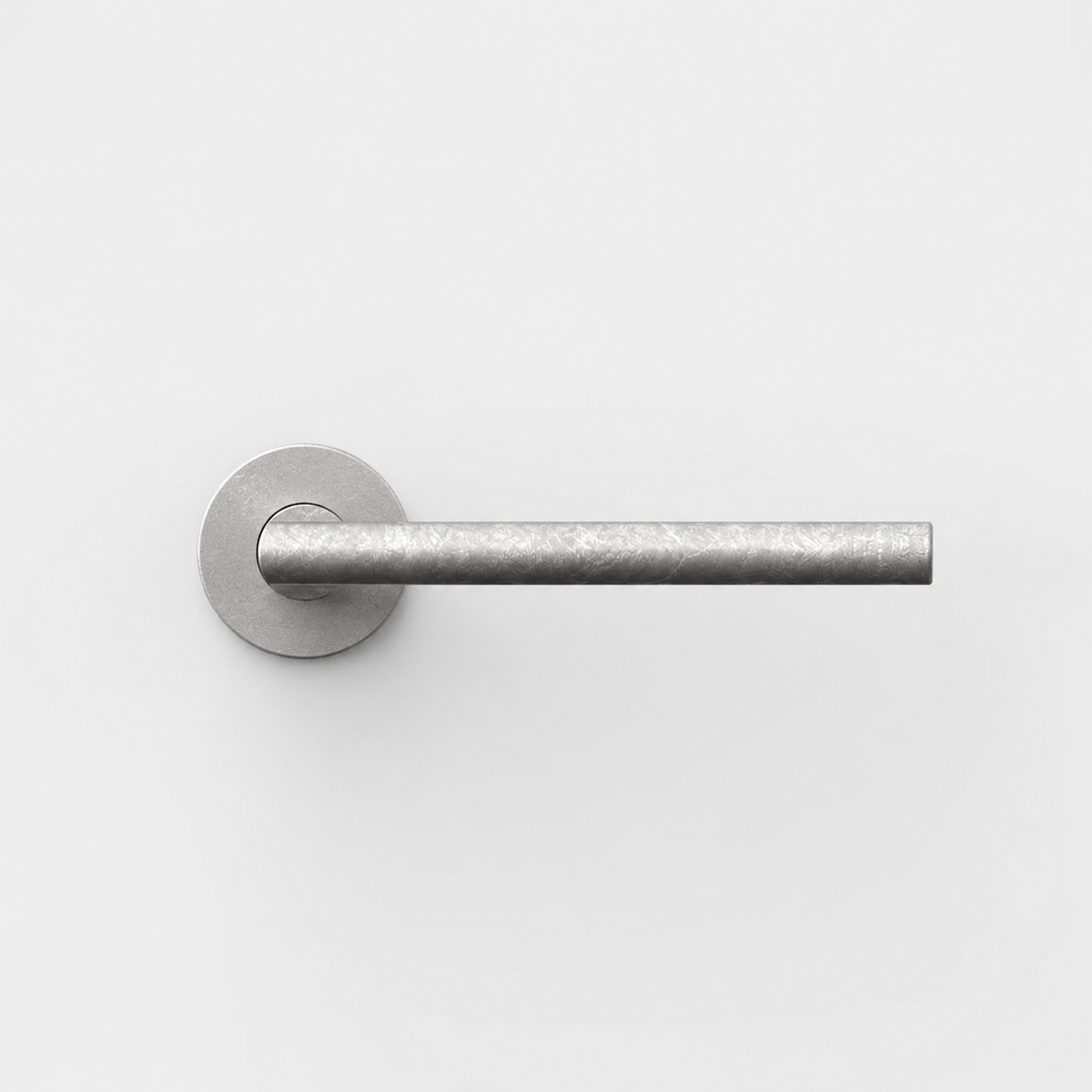 FSB 1035 architectural door lever in a textured silver finish with a minimalist, ergonomic cylindrical design.