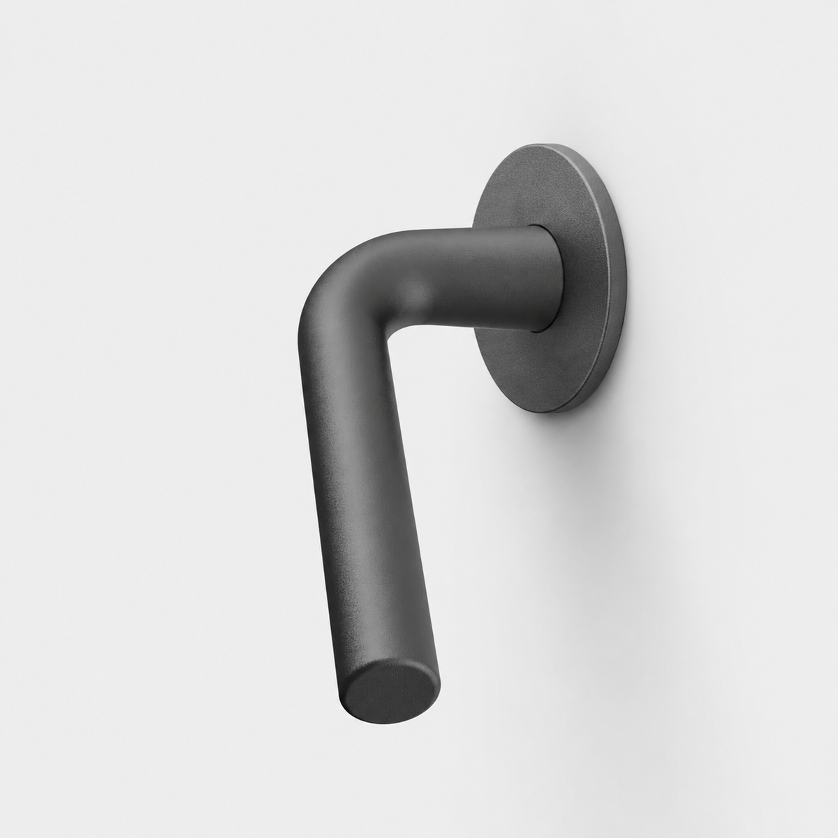 Matte black FSB 1075 L-shaped door lever with a circular rose on a white background.