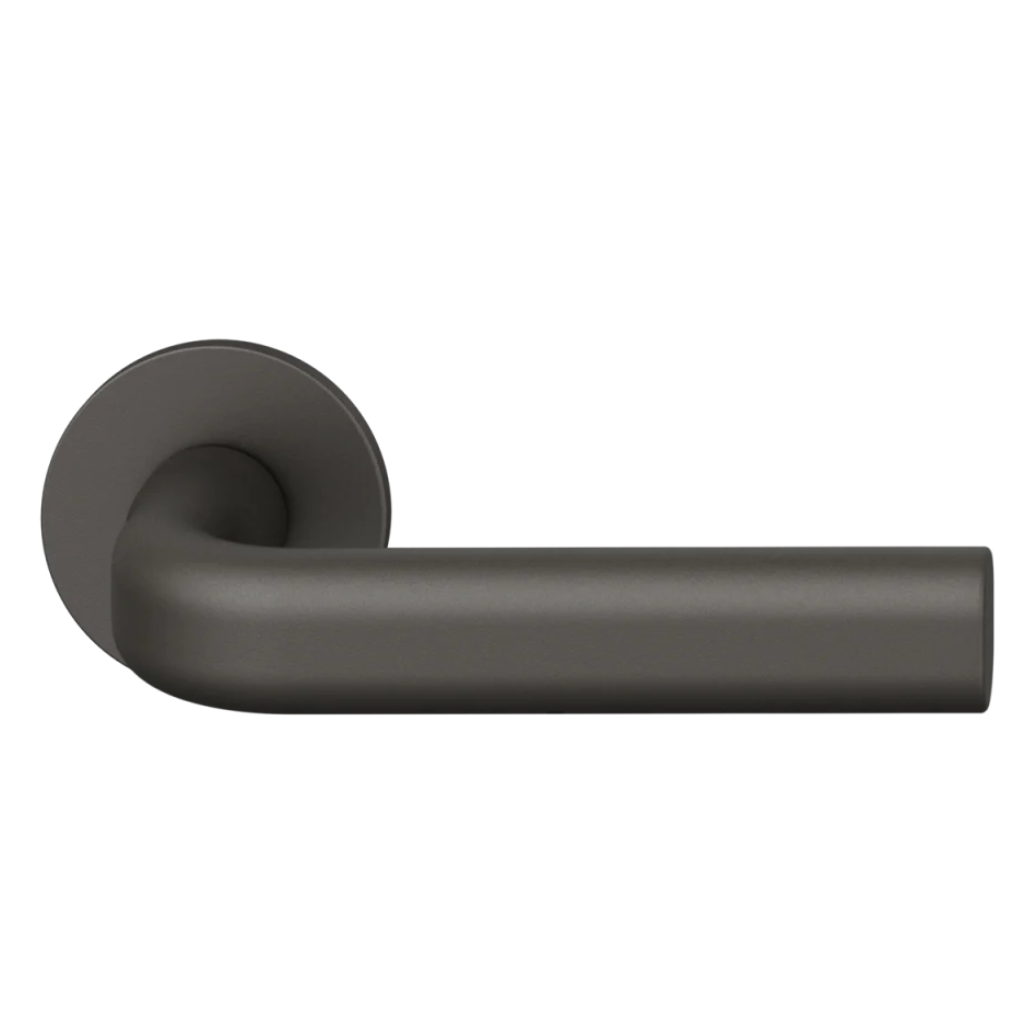 Dark bronze anodized FSB 1242 door lever, a slim oval lever on a round rose.