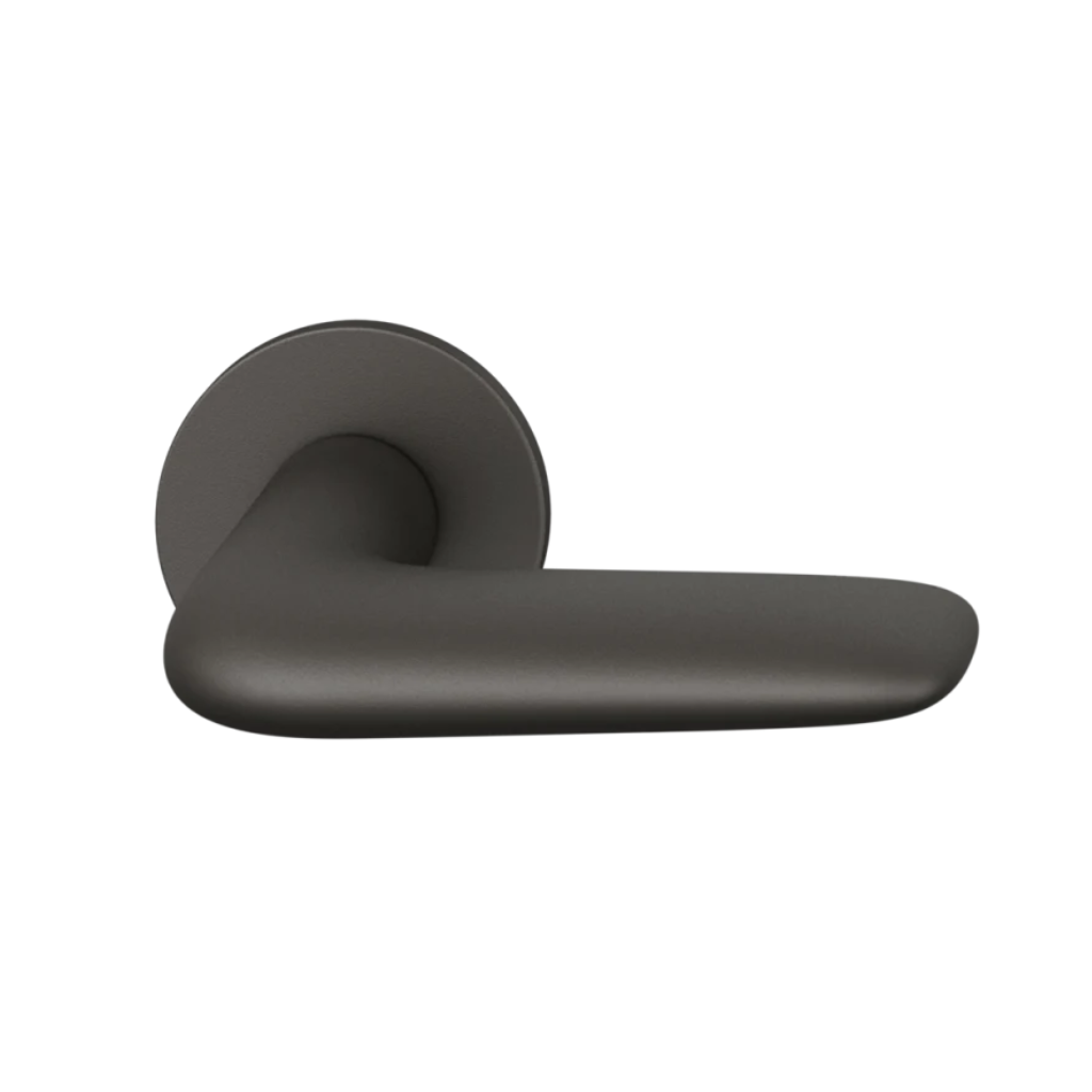 Dark bronze anodized FSB 1291 door lever, a short curved lever on a round rose.