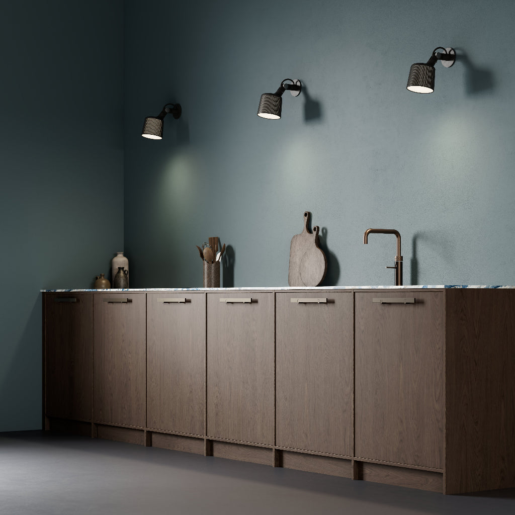 Wood kitchen cabinetry with slim brushed metal cabinet pulls