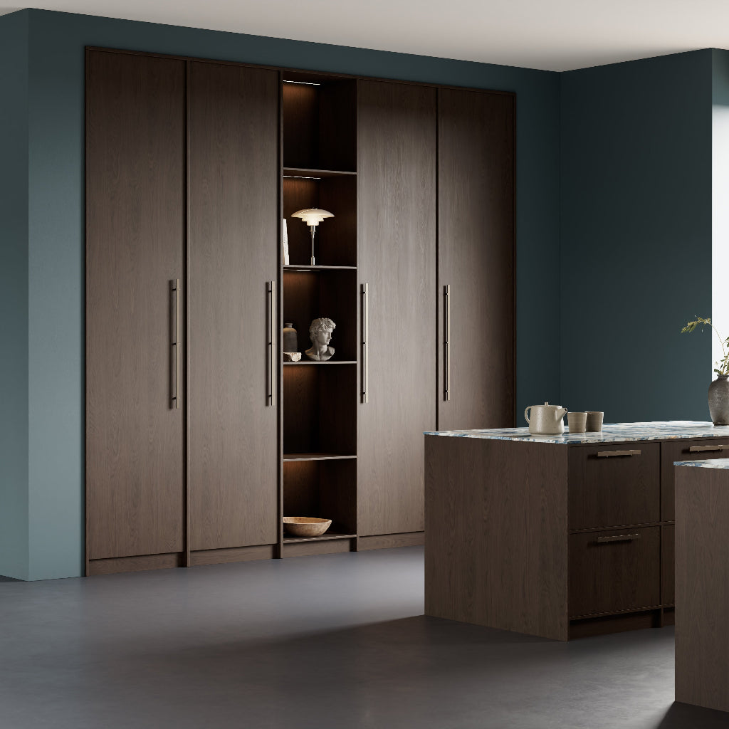 Wood cabinetry with slim brushed metal cabinet pulls