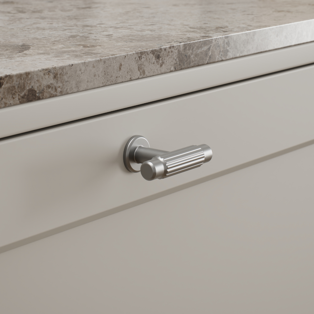 Satin nickel Furnipart Villa T cabinet knob on an oak door.