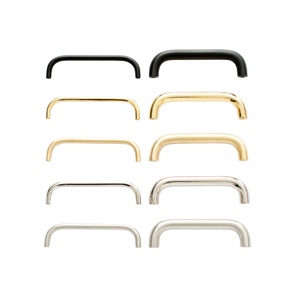 Rows of slim Grip cabinet pulls in black, brass and nickel, sorted by finish.