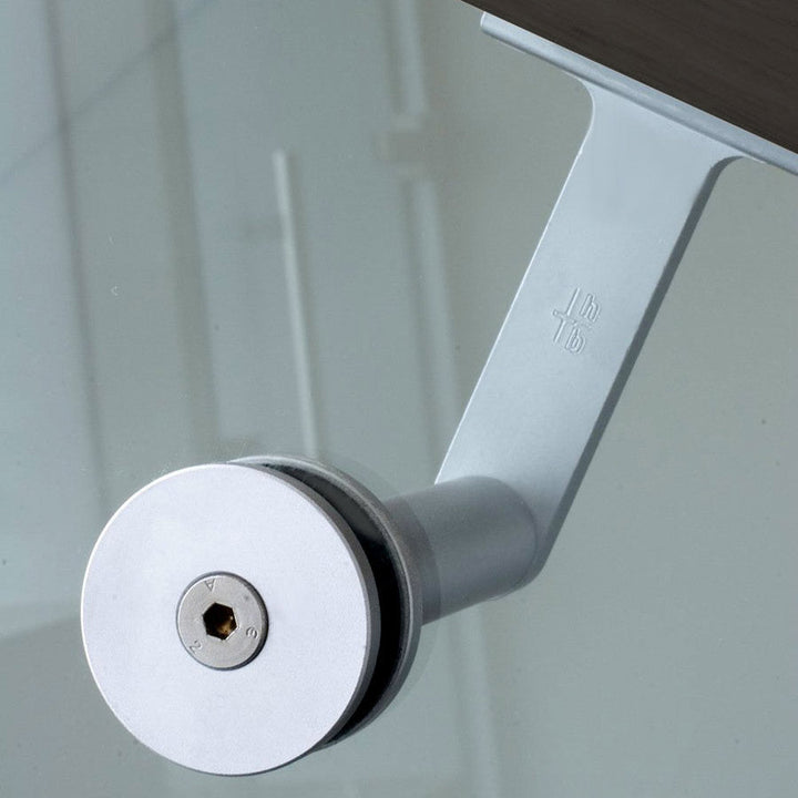 A close up of a Halliday Baillie HB 502 Glass Fixing Kit on a glass door handle.
