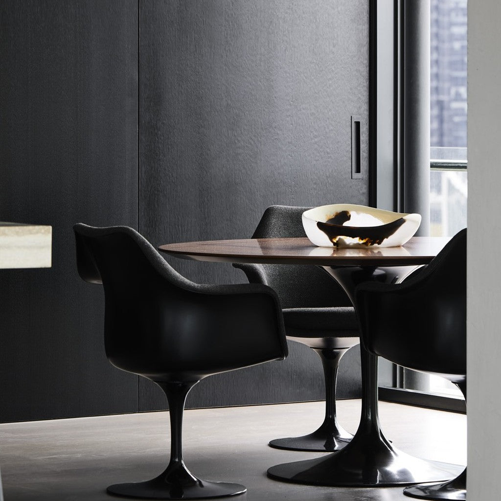 HB 677 bi-fold flush pull in a black timber sliding door in a dark dining room.