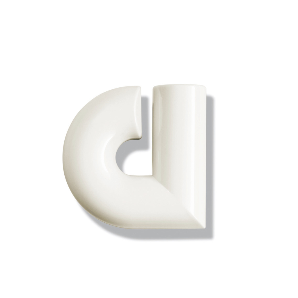 Cream Hewi house letter d, a rounded sans-serif character for wall mounting.