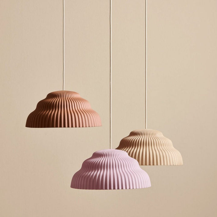 Ceramic hand cast pendant light.