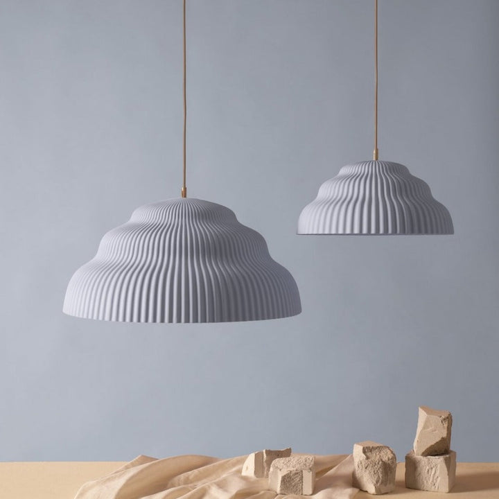 Ceramic hand cast pendant light.