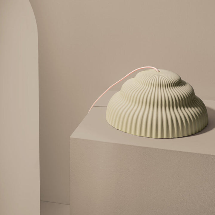 Ceramic hand cast pendant light.