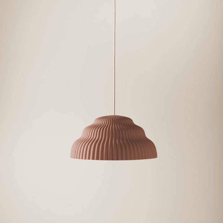Ceramic hand cast pendant light.