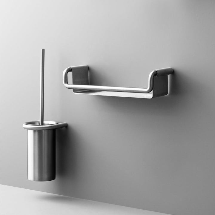 The Knud Toilet Brush Holder is part of the sanitary line by d line and is available in the following finishes: dusty grey, telegray, black, white, polished stainless, satin stainless, copper, pvd brass, pvd charcoal and gunmetal.