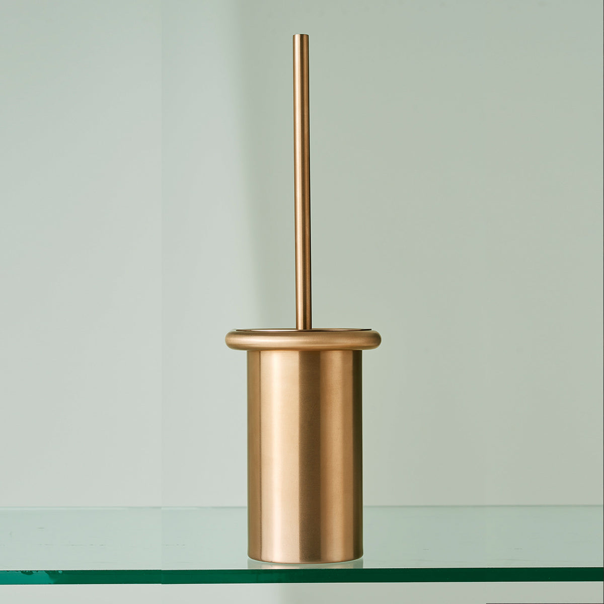 The Knud Toilet Brush Holder is part of the sanitary line by d line and is available in a variety of finishes, including copper and brass.
