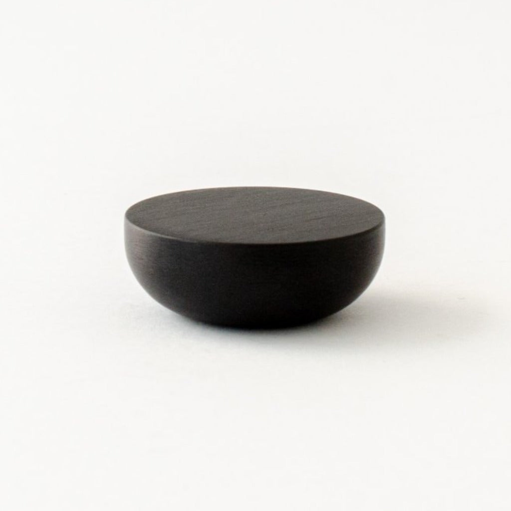 Round knob in black aluminum by Baccman Berglund