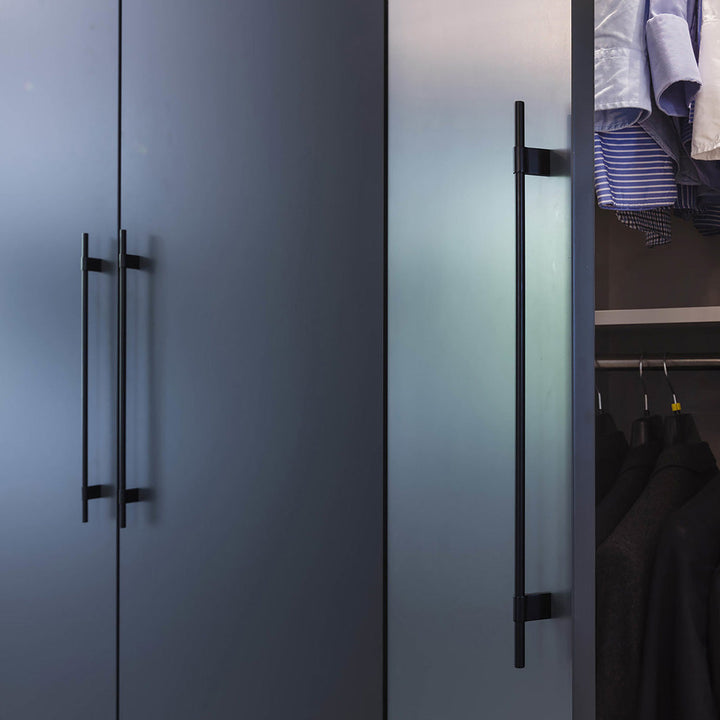 Linear and minimal cabinet pulls by Baccman and Berglund.