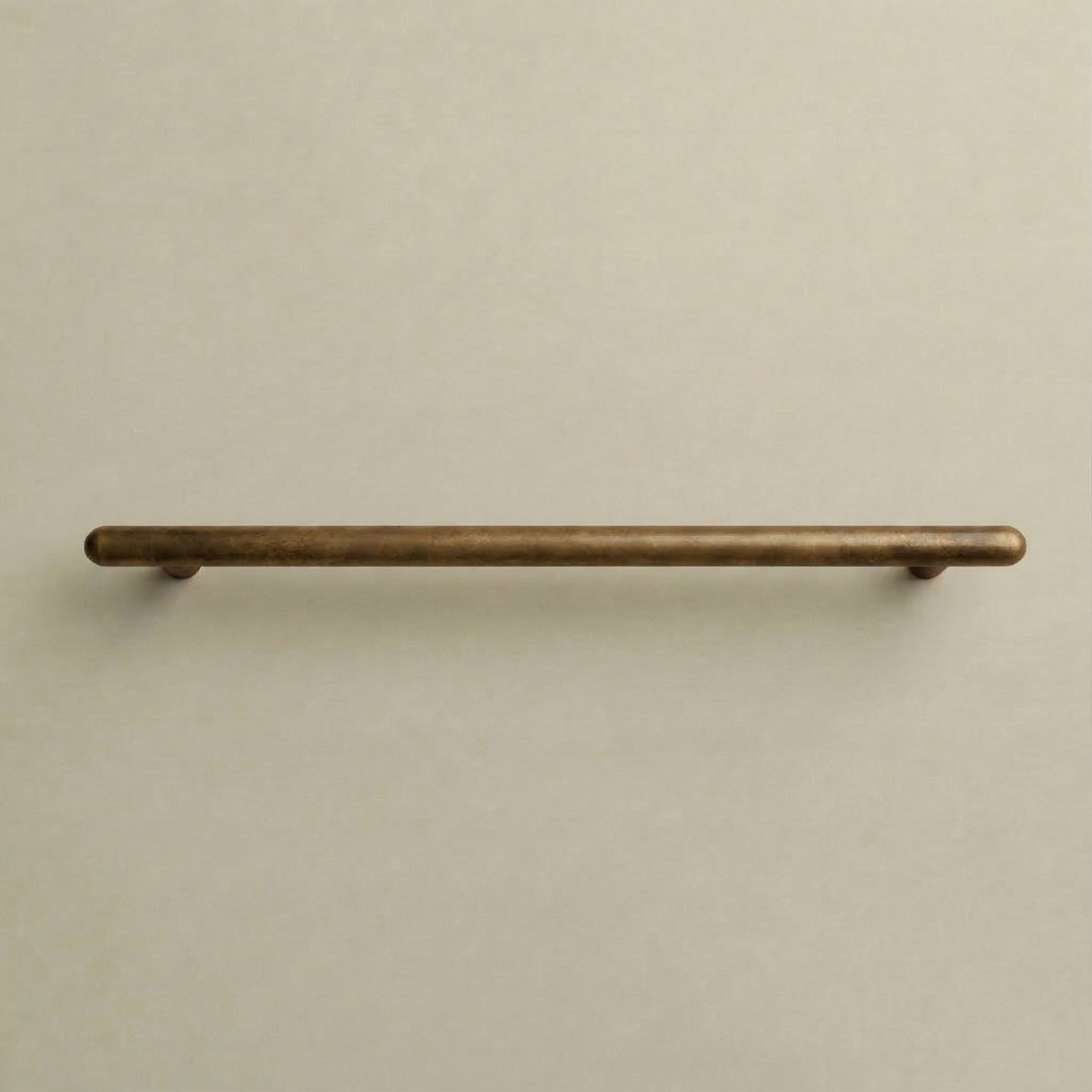 Bronze Chapman & Bose Mineral metal bar pull, a long round bar on posts.